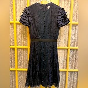 Size 8 Miri navy lace dress with fun layered short sleeves. Flattering waist.